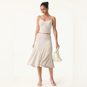 OGL Eco-SkinKiss®
Flowy Side Ruched A-line Midi Skirt
$69.00 SZ Small nwt